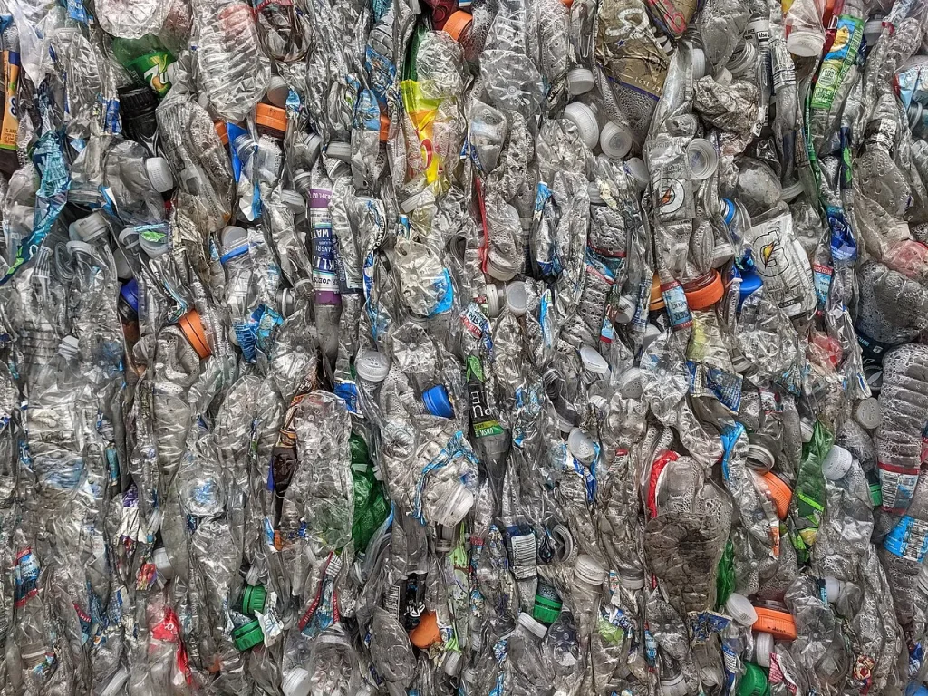 A bale of crushed PET plastic bottles ready for recycling