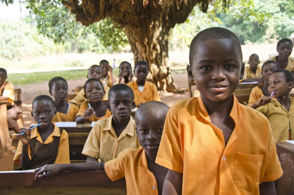 Students in a classroom studying without smartphones on their desks